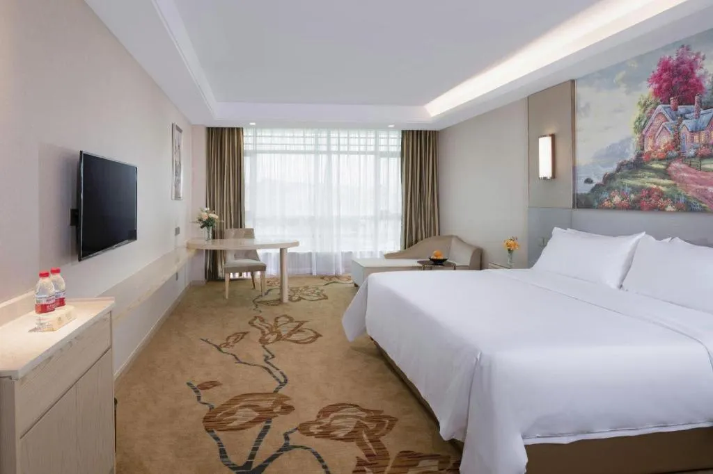 Bed in Vienna Hotel Guangdong Huizhou High-Speed North Railway Station Xiaojinkou