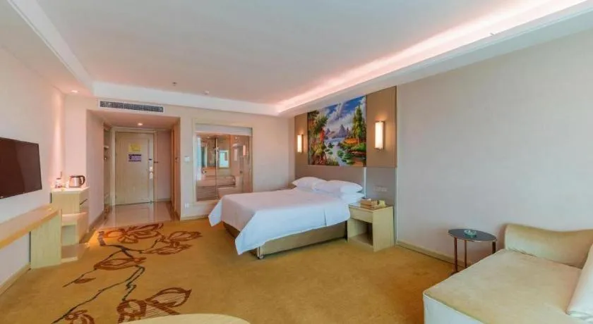 Bed in Vienna Hotel Guangdong Huizhou High-Speed North Railway Station Xiaojinkou