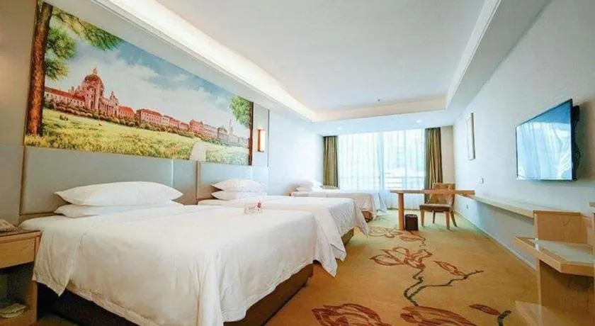 Bed in Vienna Hotel Guangdong Huizhou High-Speed North Railway Station Xiaojinkou