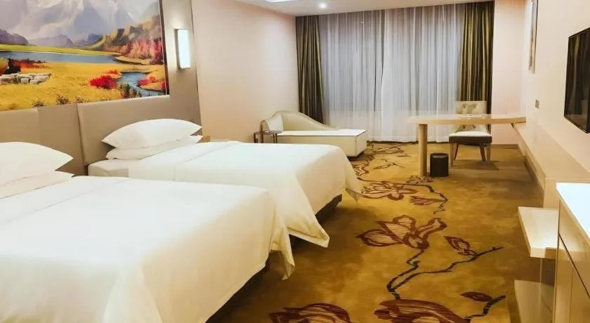 Bed in Vienna Hotel Guangdong Huizhou High-Speed North Railway Station Xiaojinkou