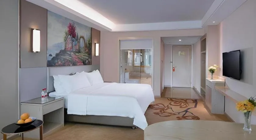 Bed in Vienna Hotel Guangdong Huizhou High-Speed North Railway Station Xiaojinkou