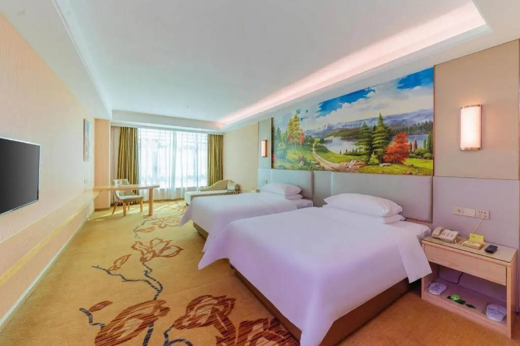 Bed in Vienna Hotel Guangdong Huizhou High-Speed North Railway Station Xiaojinkou