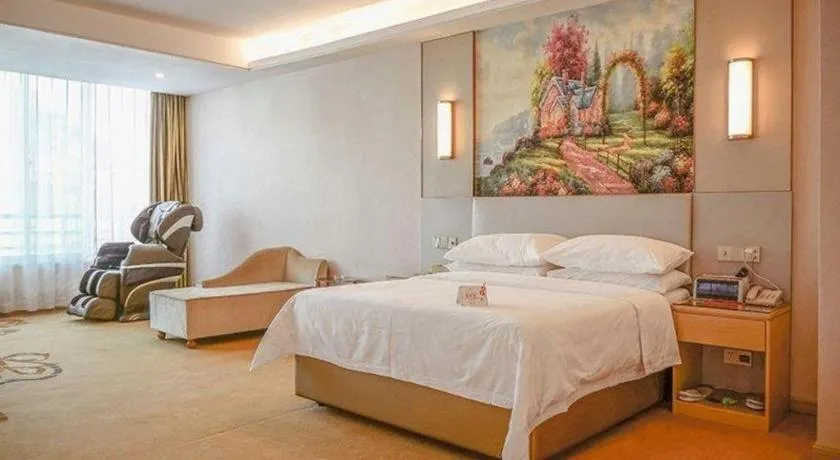 Bed in Vienna Hotel Guangdong Huizhou High-Speed North Railway Station Xiaojinkou