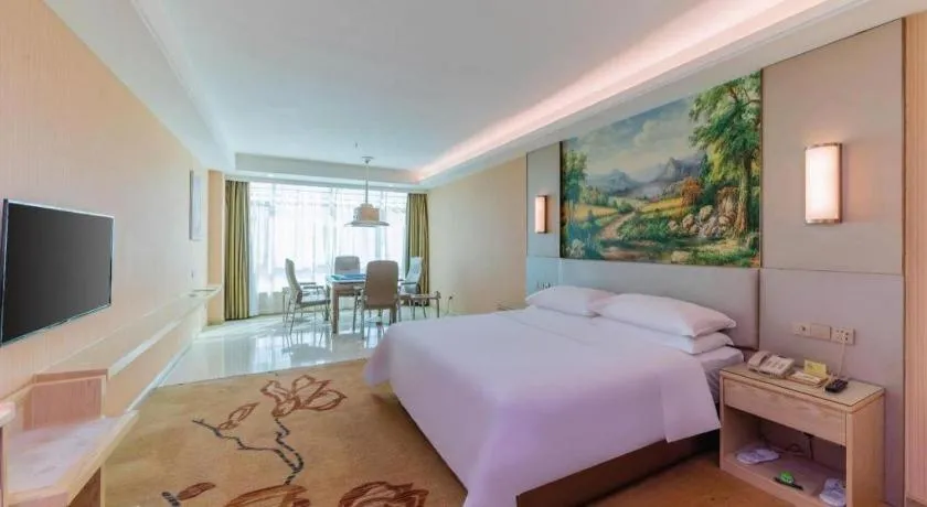 Bed in Vienna Hotel Guangdong Huizhou High-Speed North Railway Station Xiaojinkou