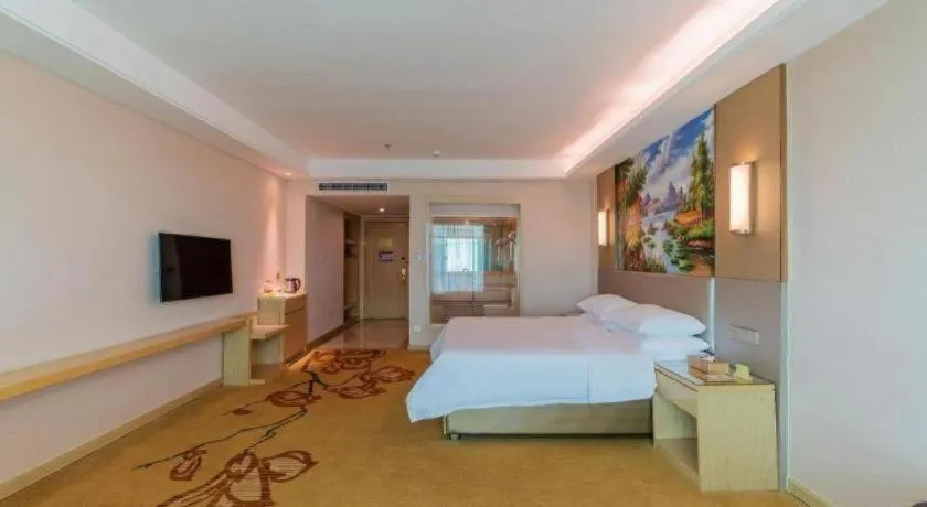 Bed in Vienna Hotel Guangdong Huizhou High-Speed North Railway Station Xiaojinkou