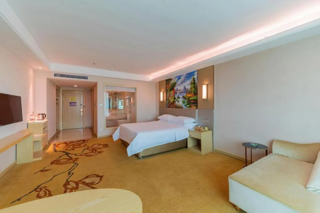 Bed in Vienna Hotel Guangdong Huizhou High-Speed North Railway Station Xiaojinkou