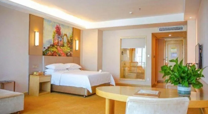 Bed in Vienna Hotel Guangdong Huizhou High-Speed North Railway Station Xiaojinkou