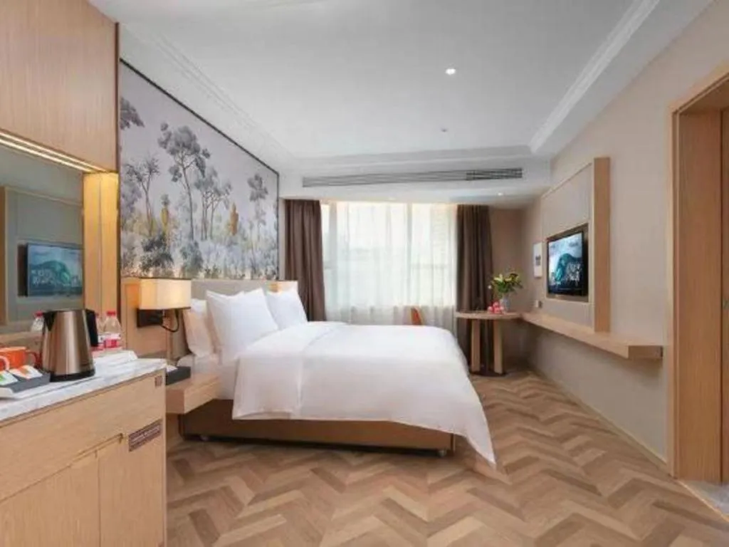 Bed in Vienna Hotel Yongzhou Dong'an High-Speed Railway Station