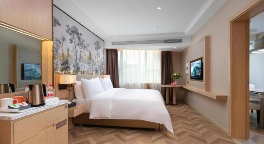 Bed in Vienna Hotel Yongzhou Dong'an High-Speed Railway Station