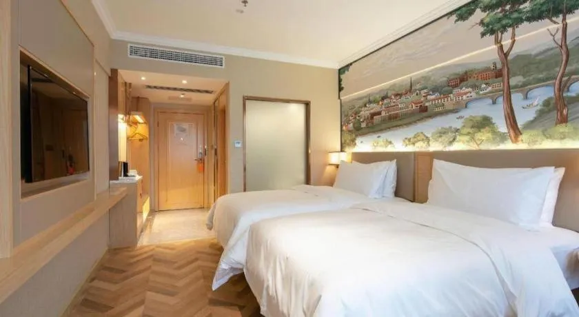 Bed in Vienna Hotel Yongzhou Dong'an High-Speed Railway Station