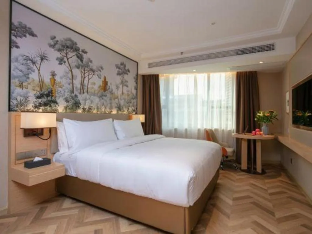 Bed in Vienna Hotel Yongzhou Dong'an High-Speed Railway Station