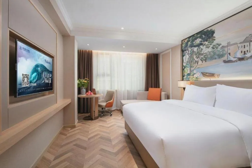 Bed in Vienna Hotel Yongzhou Dong'an High-Speed Railway Station