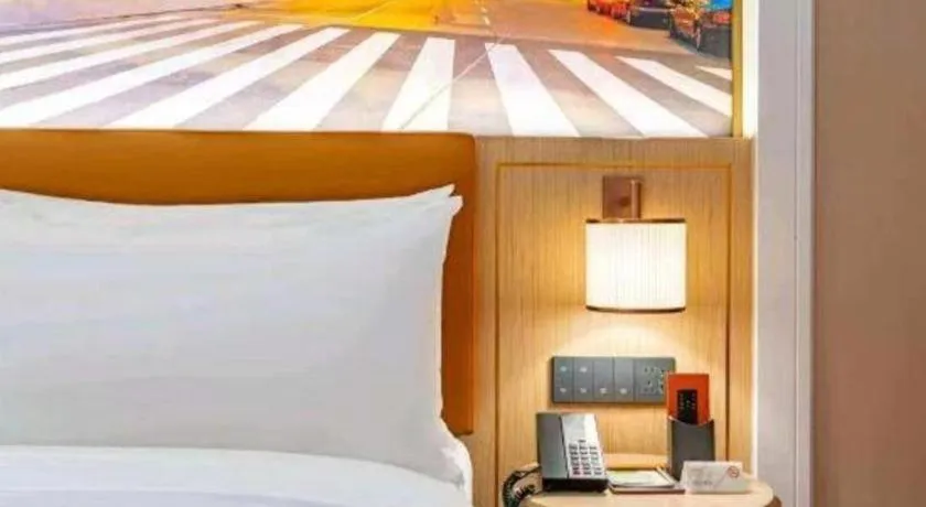 Bed in Vienna Hotel Yongzhou Dong'an High-Speed Railway Station
