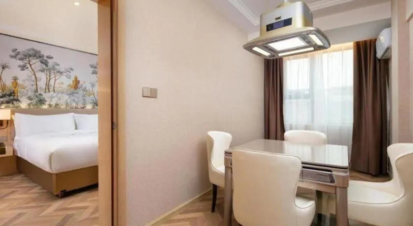 Bed in Vienna Hotel Yongzhou Dong'an High-Speed Railway Station