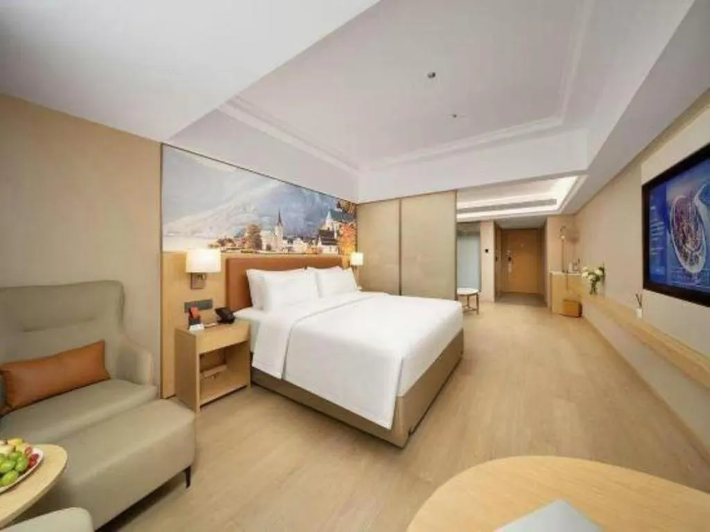 Bed in Vienna Hotel Yongzhou Dong'an High-Speed Railway Station