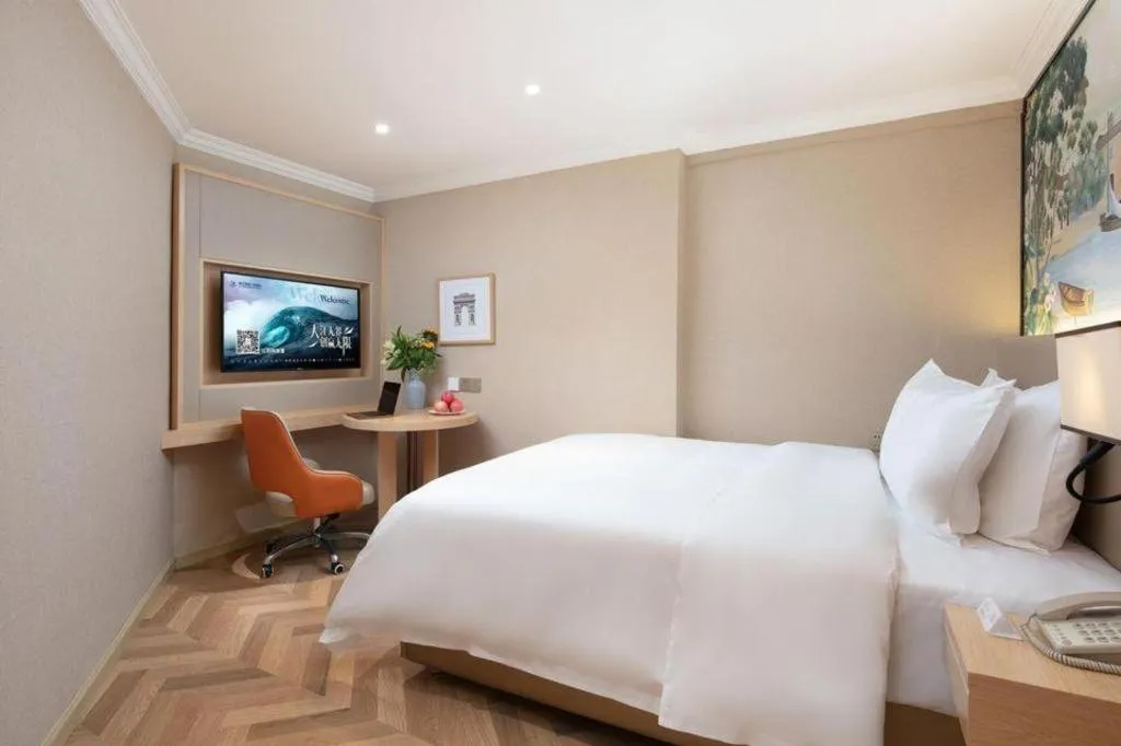 Bed in Vienna Hotel Yongzhou Dong'an High-Speed Railway Station