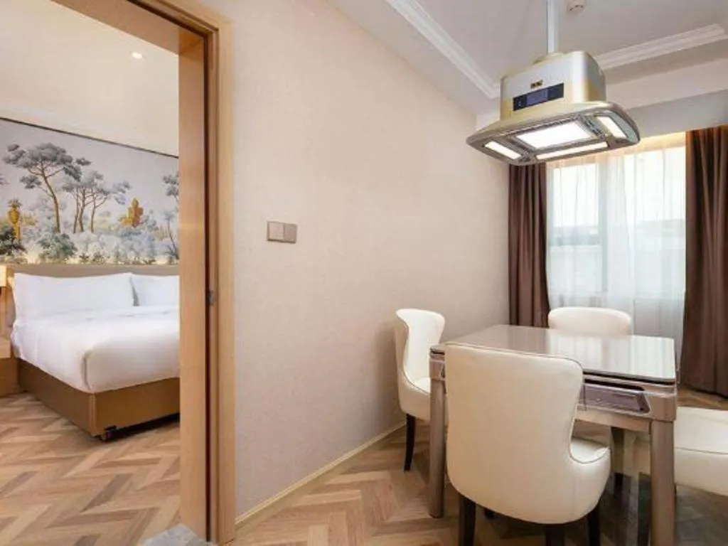 Bed in Vienna Hotel Yongzhou Dong'an High-Speed Railway Station