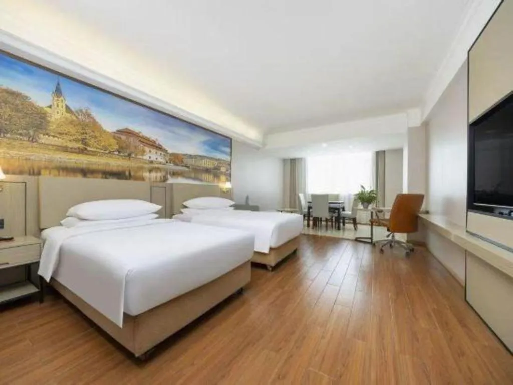 Bed in Vienna Hotel Yongzhou Dong'an High-Speed Railway Station