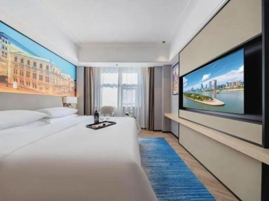 Bed in Vienna Hotel Yongzhou Dong'an High-Speed Railway Station