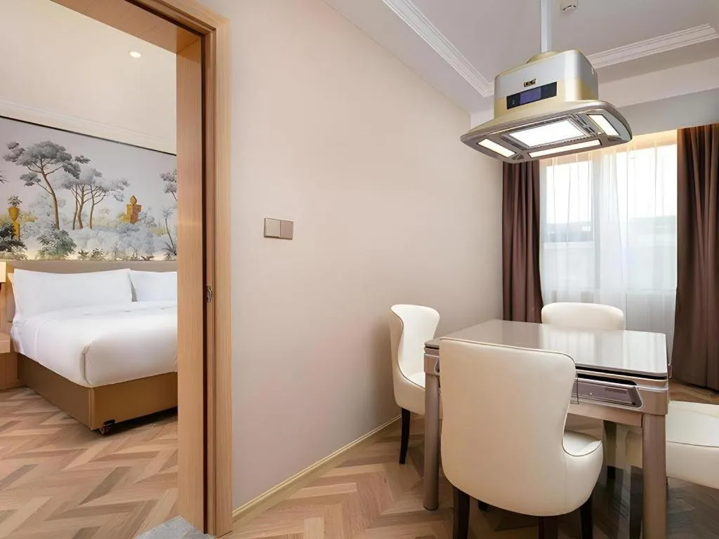 Bed in Vienna Hotel Yongzhou Dong'an High-Speed Railway Station