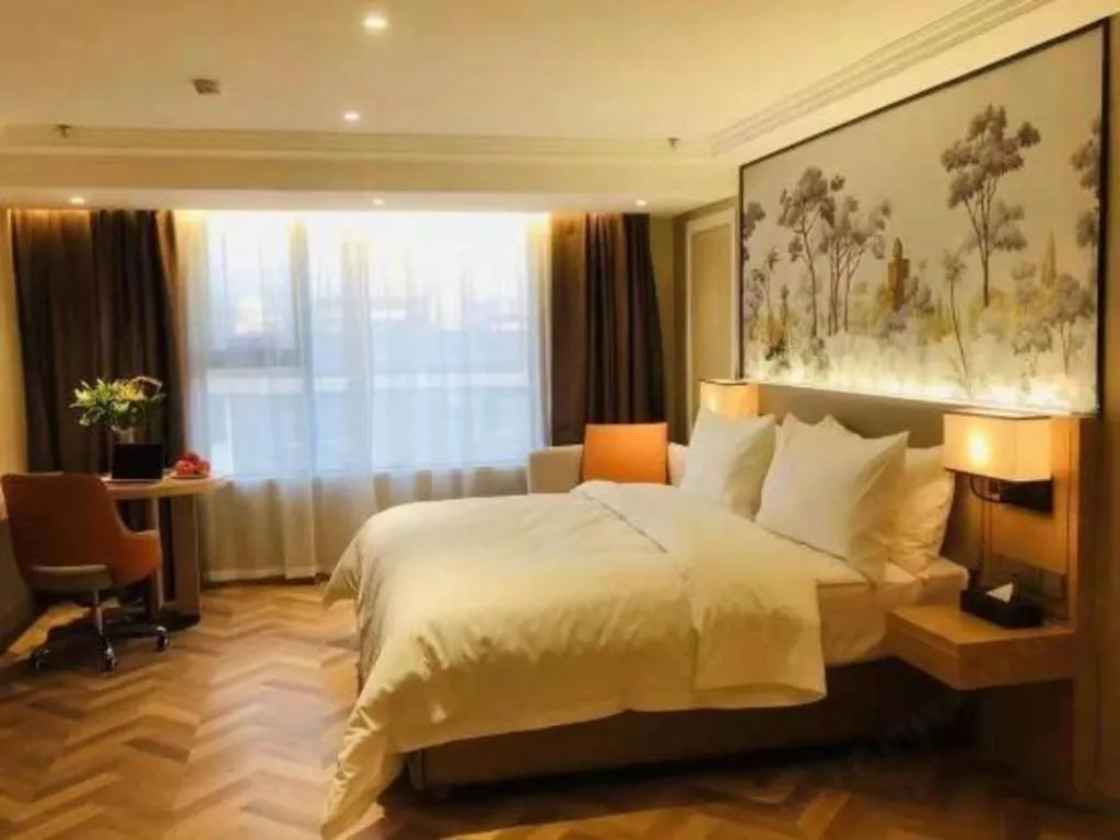 Bed in Vienna Hotel Yongzhou Dong'an High-Speed Railway Station