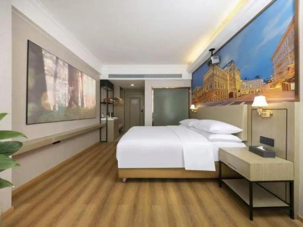 Bed in Vienna Hotel Yongzhou Dong'an High-Speed Railway Station