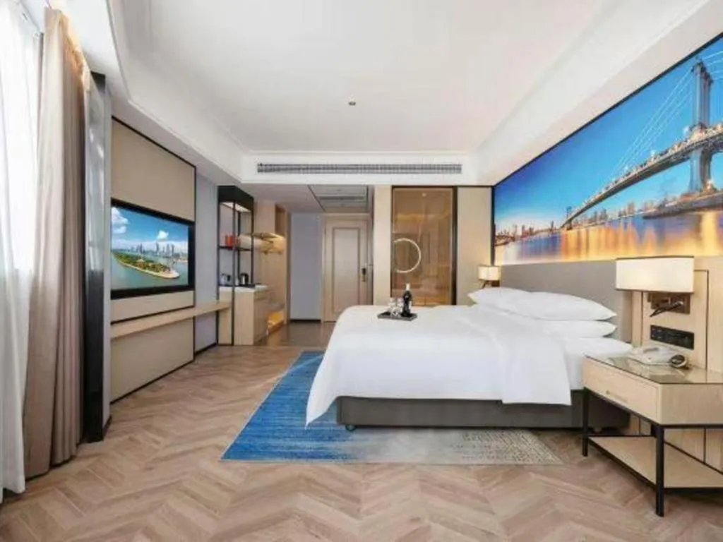 Bed in Vienna Hotel Yongzhou Dong'an High-Speed Railway Station