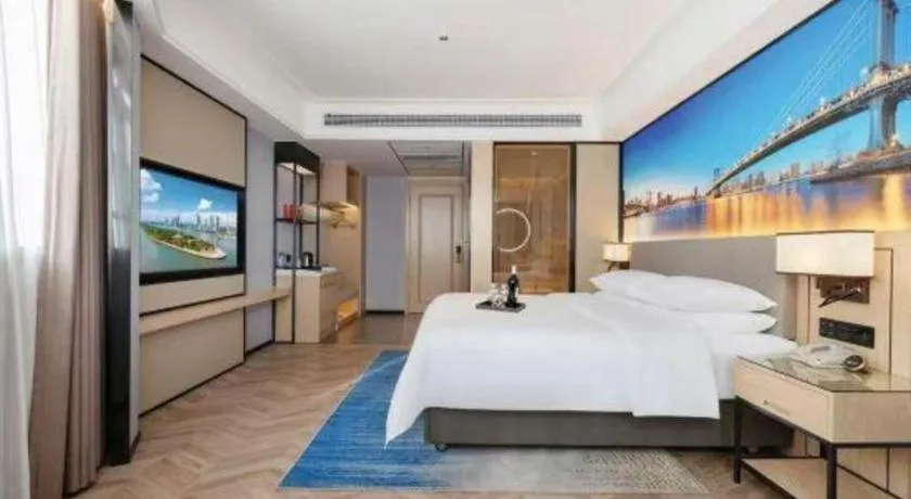 Bed in Vienna Hotel Yongzhou Dong'an High-Speed Railway Station