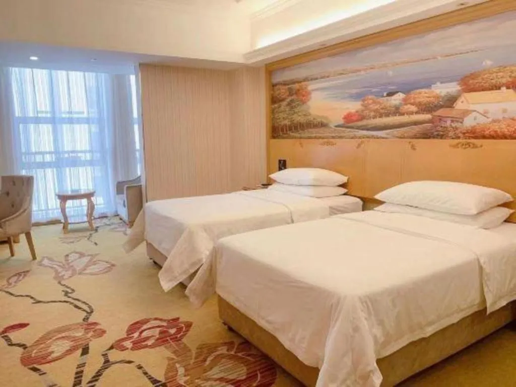 Bed in Vienna Hotel Henan Luoyang Jiudu Road Wanda