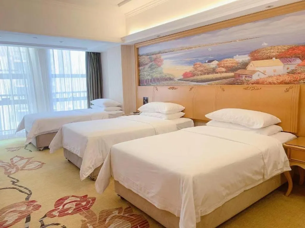 Bed in Vienna Hotel Henan Luoyang Jiudu Road Wanda