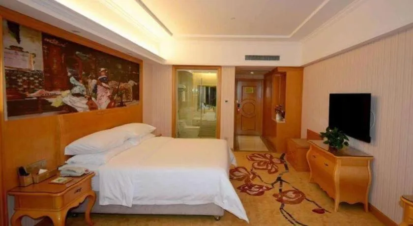 Bed in Vienna Hotel Henan Luoyang Jiudu Road Wanda