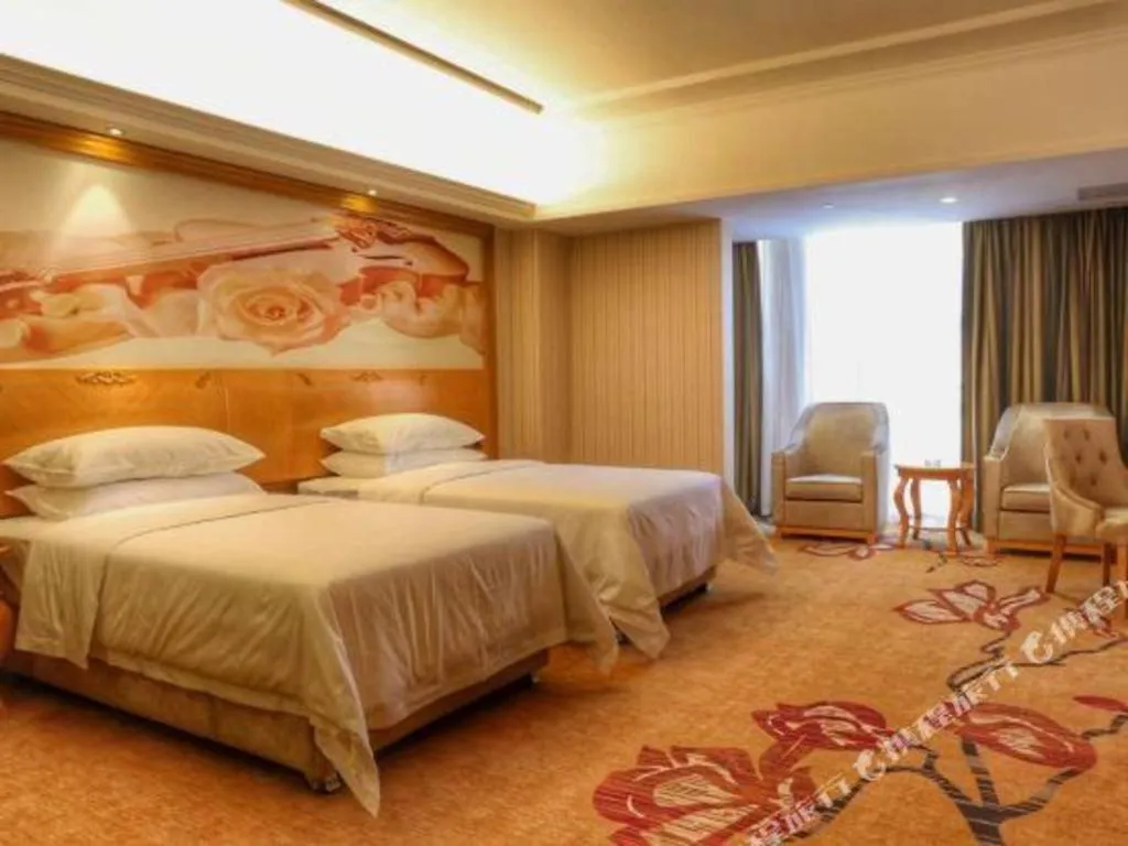 Bed in Vienna Hotel Henan Luoyang Jiudu Road Wanda