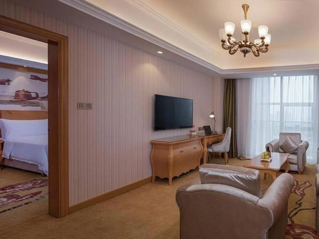 Bed in Vienna Hotel Henan Luoyang Jiudu Road Wanda