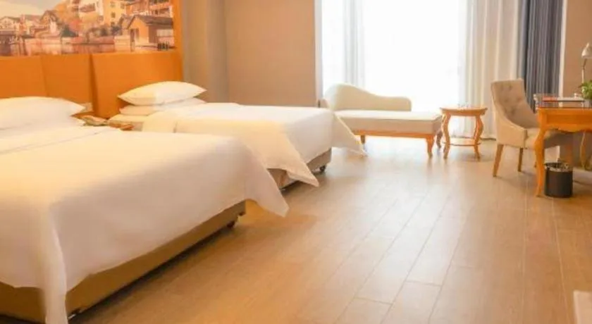 Bed in Vienna Hotel Henan Luoyang Jiudu Road Wanda