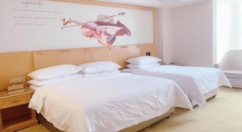 Bed in Vienna Hotel Henan Luoyang Jiudu Road Wanda