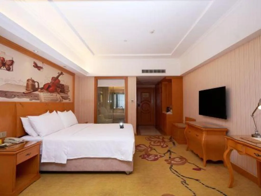 Bed in Vienna Hotel Henan Luoyang Jiudu Road Wanda