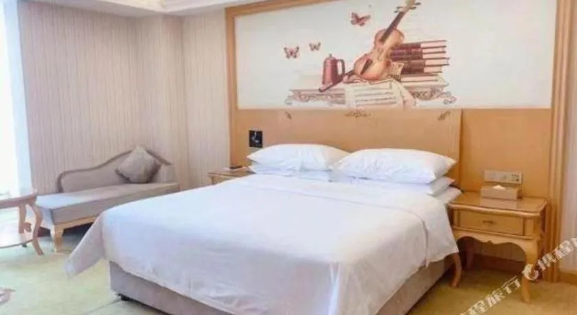Bed in Vienna Hotel Henan Luoyang Jiudu Road Wanda