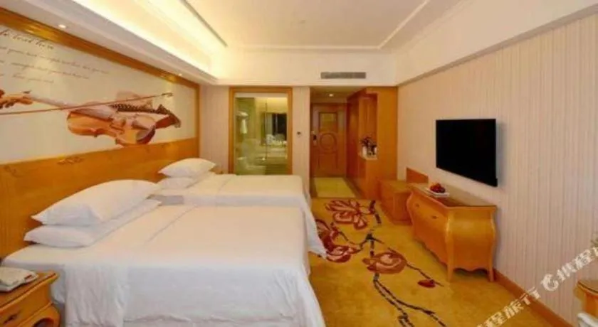 Bed in Vienna Hotel Henan Luoyang Jiudu Road Wanda