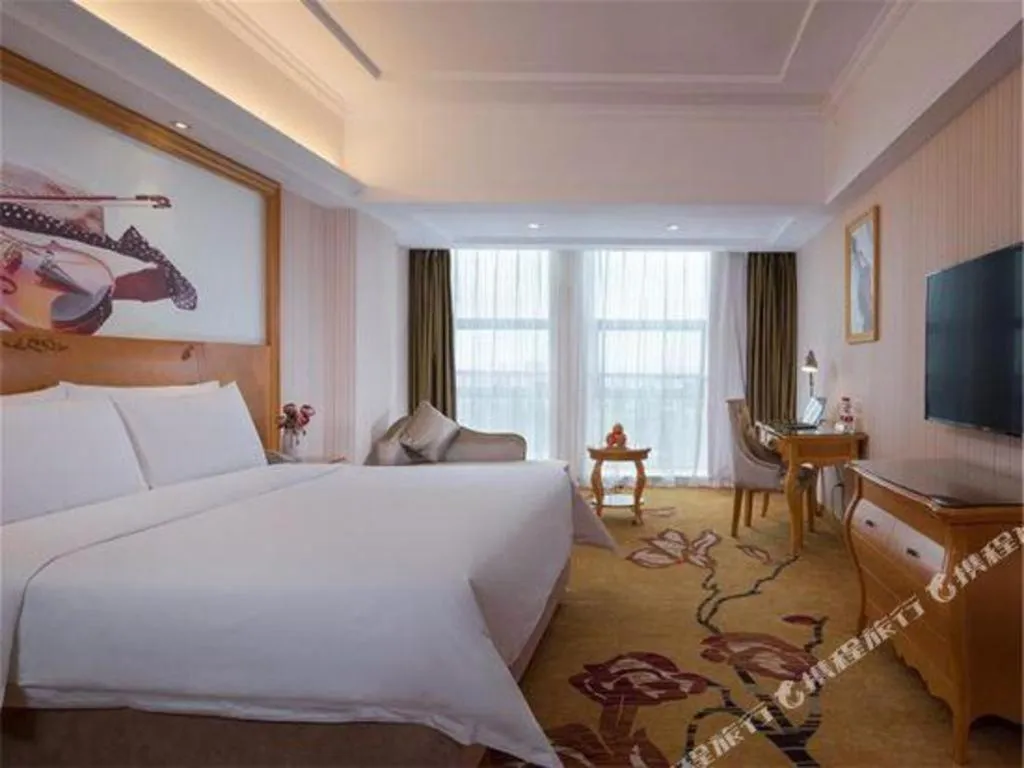 Bed in Vienna Hotel Henan Luoyang Jiudu Road Wanda