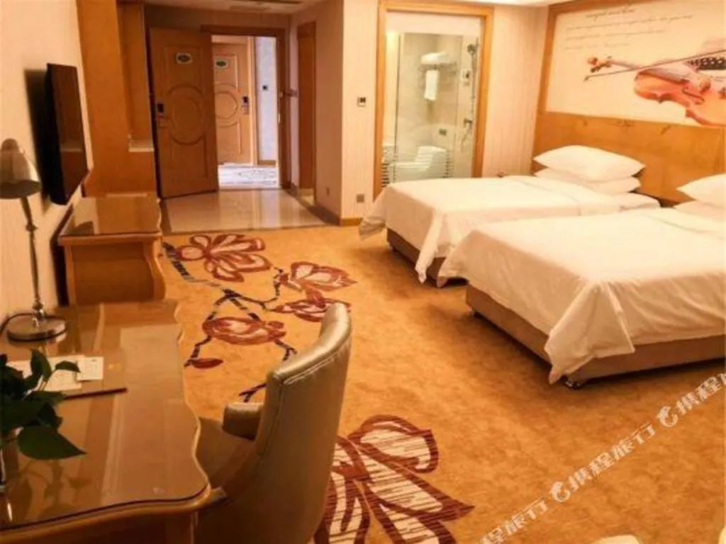 Bed in Vienna Hotel Henan Luoyang Jiudu Road Wanda