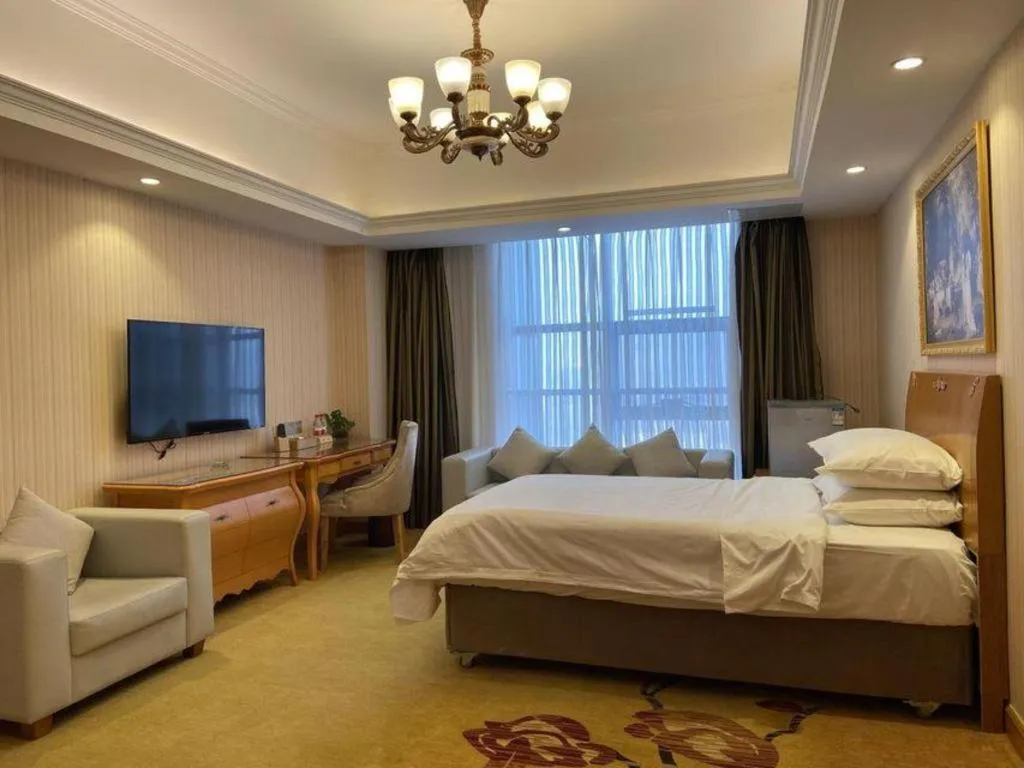 Bed in Vienna Hotel Henan Luoyang Jiudu Road Wanda