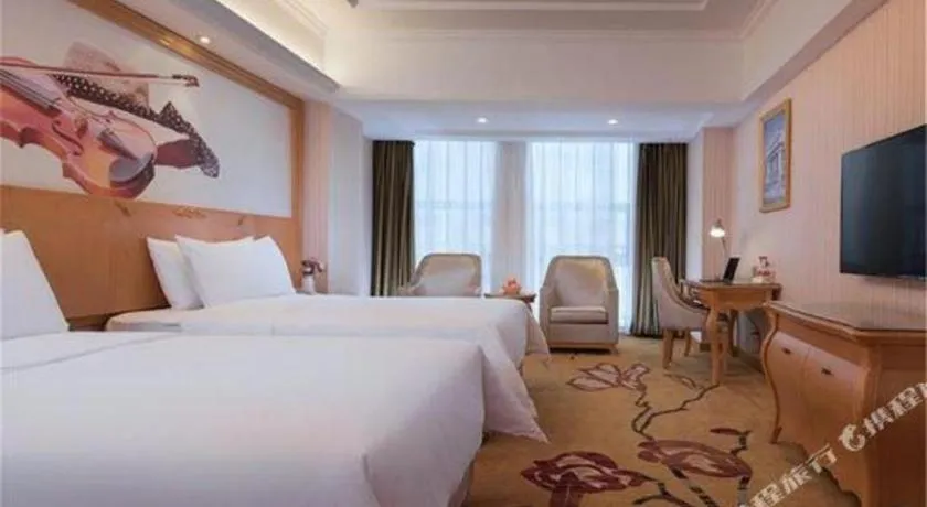 Bed in Vienna Hotel Henan Luoyang Jiudu Road Wanda