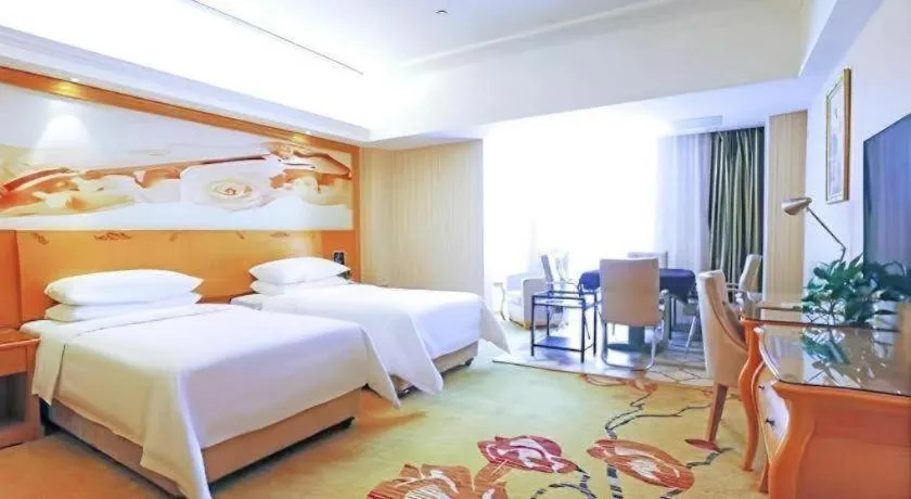 Bed in Vienna Hotel Henan Luoyang Jiudu Road Wanda