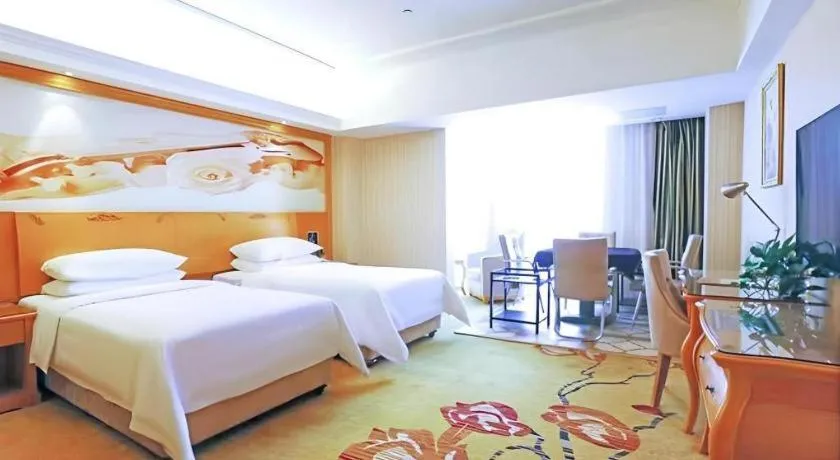 Bed in Vienna Hotel Henan Luoyang Jiudu Road Wanda