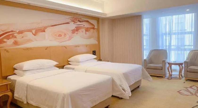 Bed in Vienna Hotel Henan Luoyang Jiudu Road Wanda
