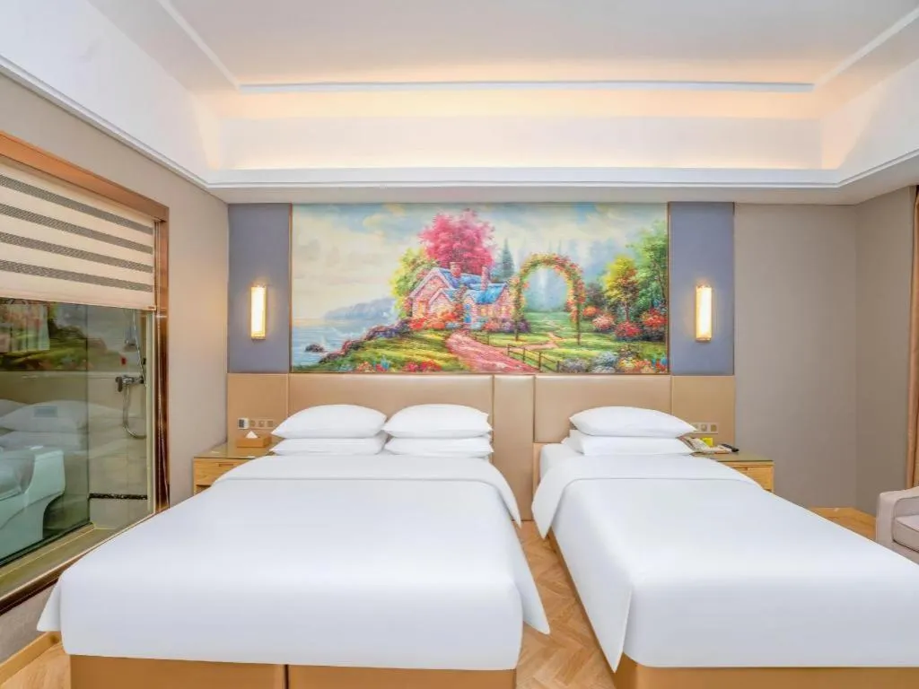 Bed in Vienna Hotel Jiangsu Zhangjiagang Passenger Terminal Station