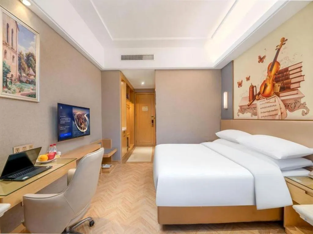 Bed in Vienna Hotel Jiangsu Zhangjiagang Passenger Terminal Station