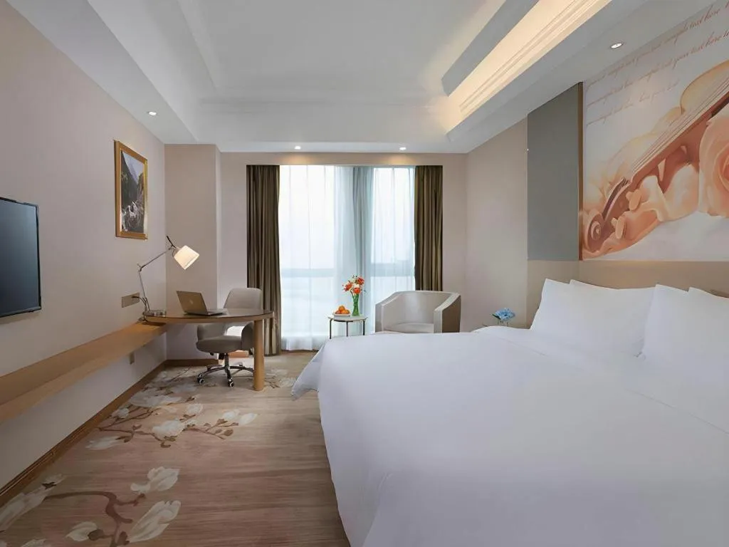 Bed in Vienna Hotel Jiangsu Zhangjiagang Passenger Terminal Station