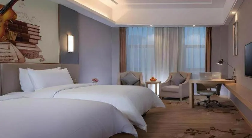 Bed in Vienna Hotel Jiangsu Zhangjiagang Passenger Terminal Station