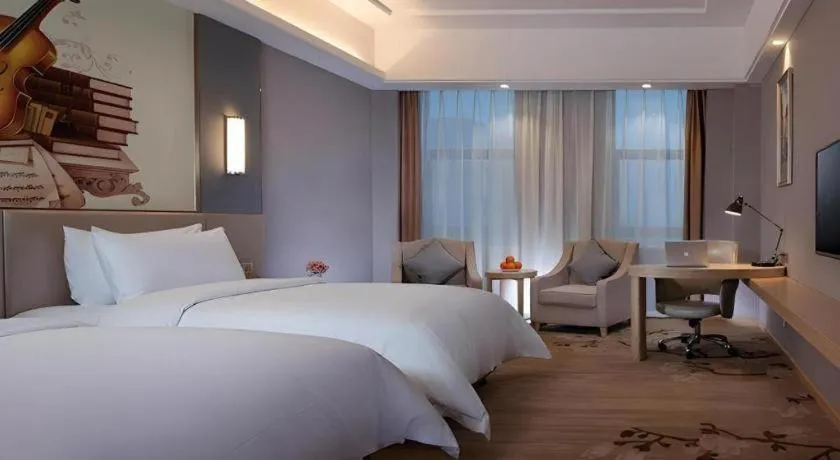 Bed in Vienna Hotel Jiangsu Zhangjiagang Passenger Terminal Station